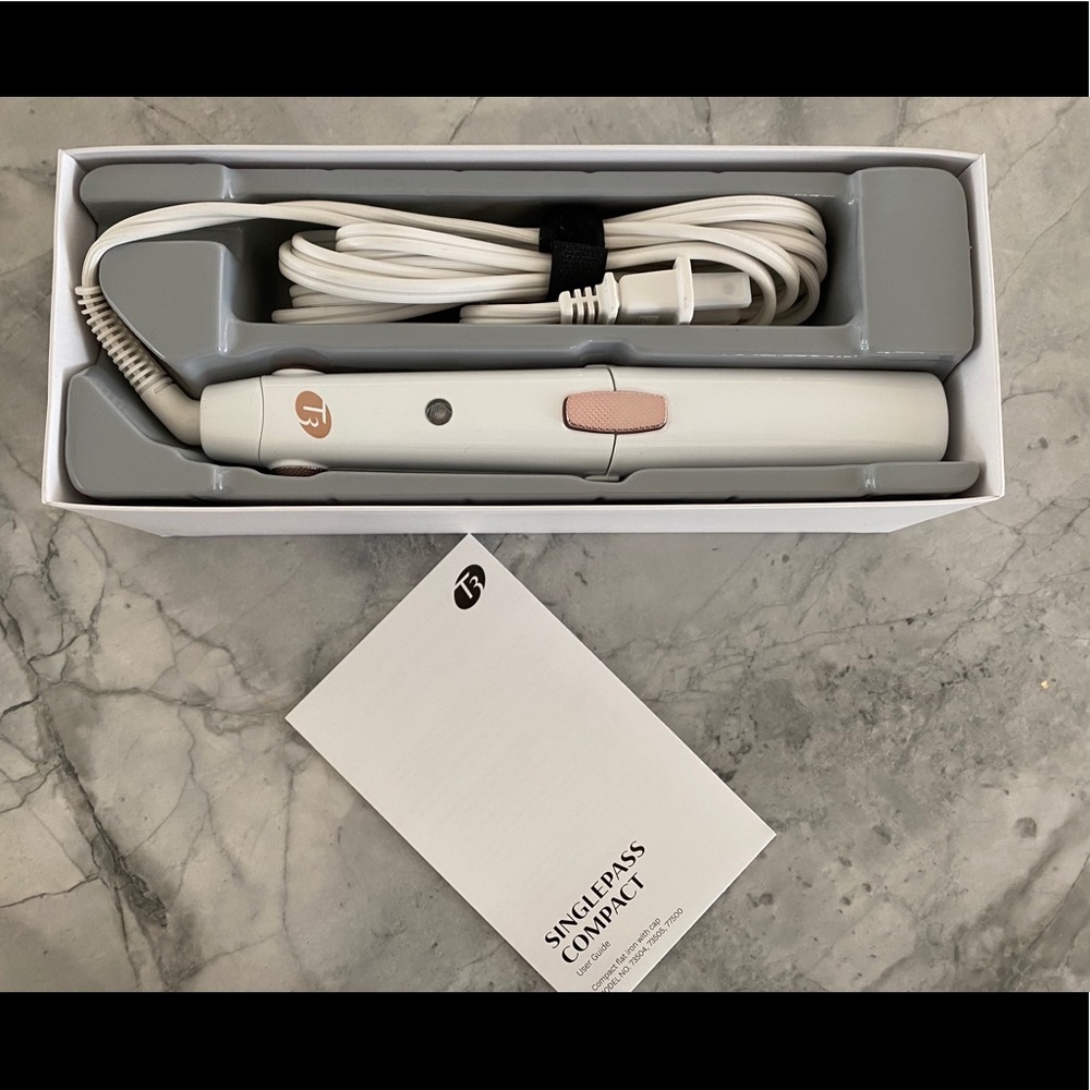 Brand new T3 flat iron